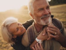 Elderly Couple In Sunset